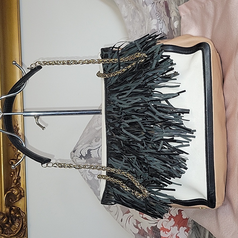 CHRISTIAN LOUBOUTIN leather in chain bag with black fringes